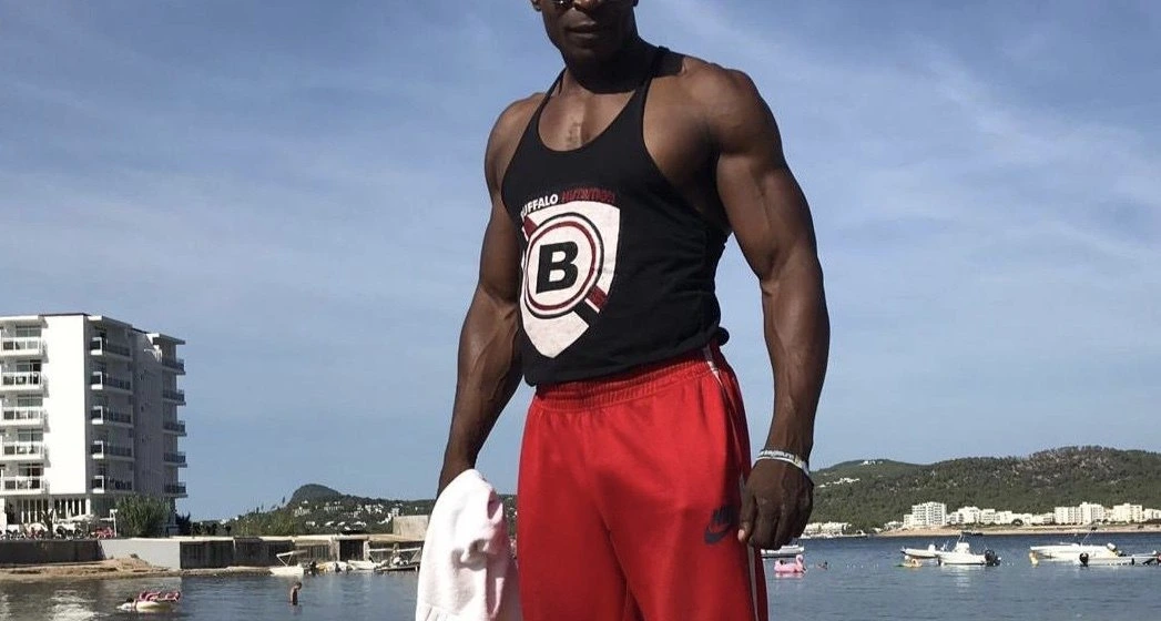 Confident man silhouette representing the Bull role in cuckolding