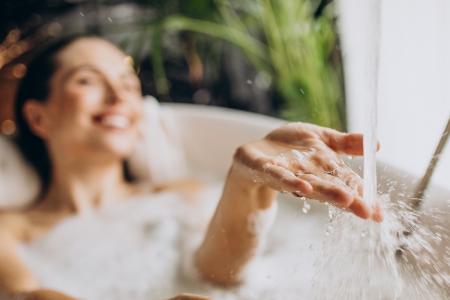 A luxurious bath setup representing self-care, temperature play, and high-end wellness