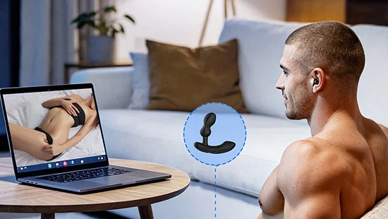 Person using Lovense Edge 2 prostate massager while watching trans live cams on smartphone