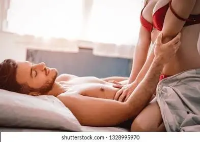 Couple using TENGA FLIP ZERO while watching live couples cams on laptop